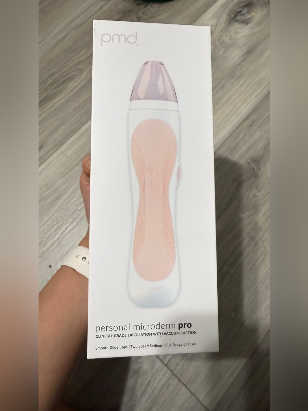 PMD Personal Microderm Pro in Light Pink and White
